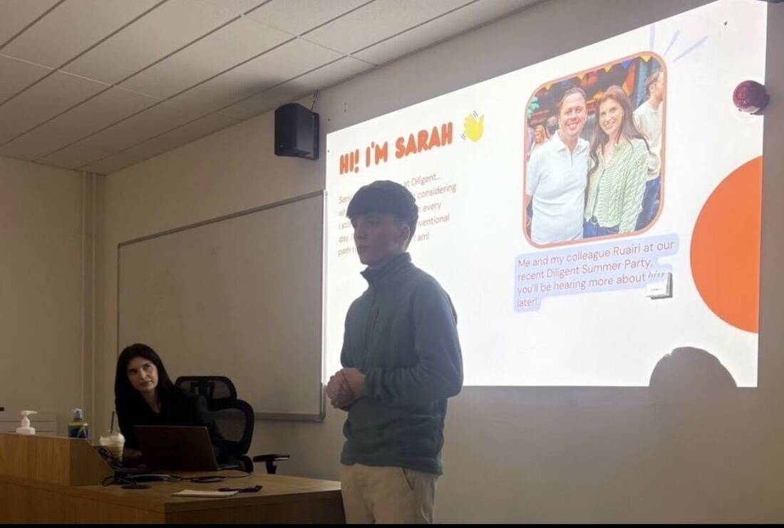 Seán introducing a guest speaker at a society talk